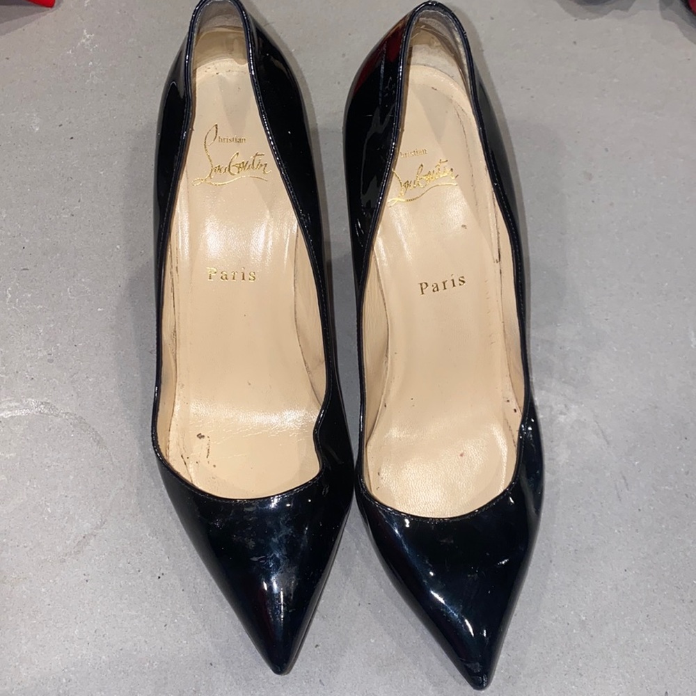 Louboutins black heels red bottoms